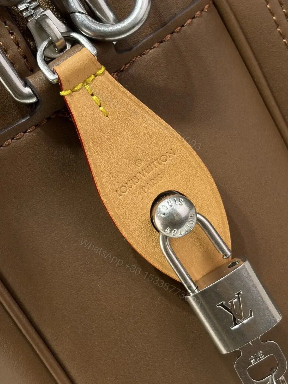 View 9 of Brown Leather Minimalist Messenger Bag with Subtle Stitching Details