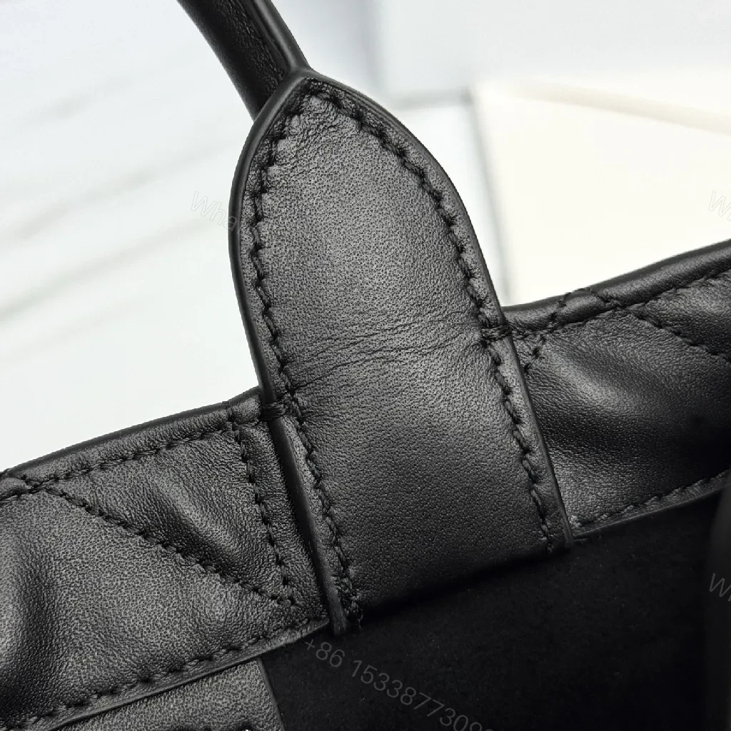 View 4 of Quilted Mini Bag: Diamond Stitch, Gold Charm, Crossbody Carry