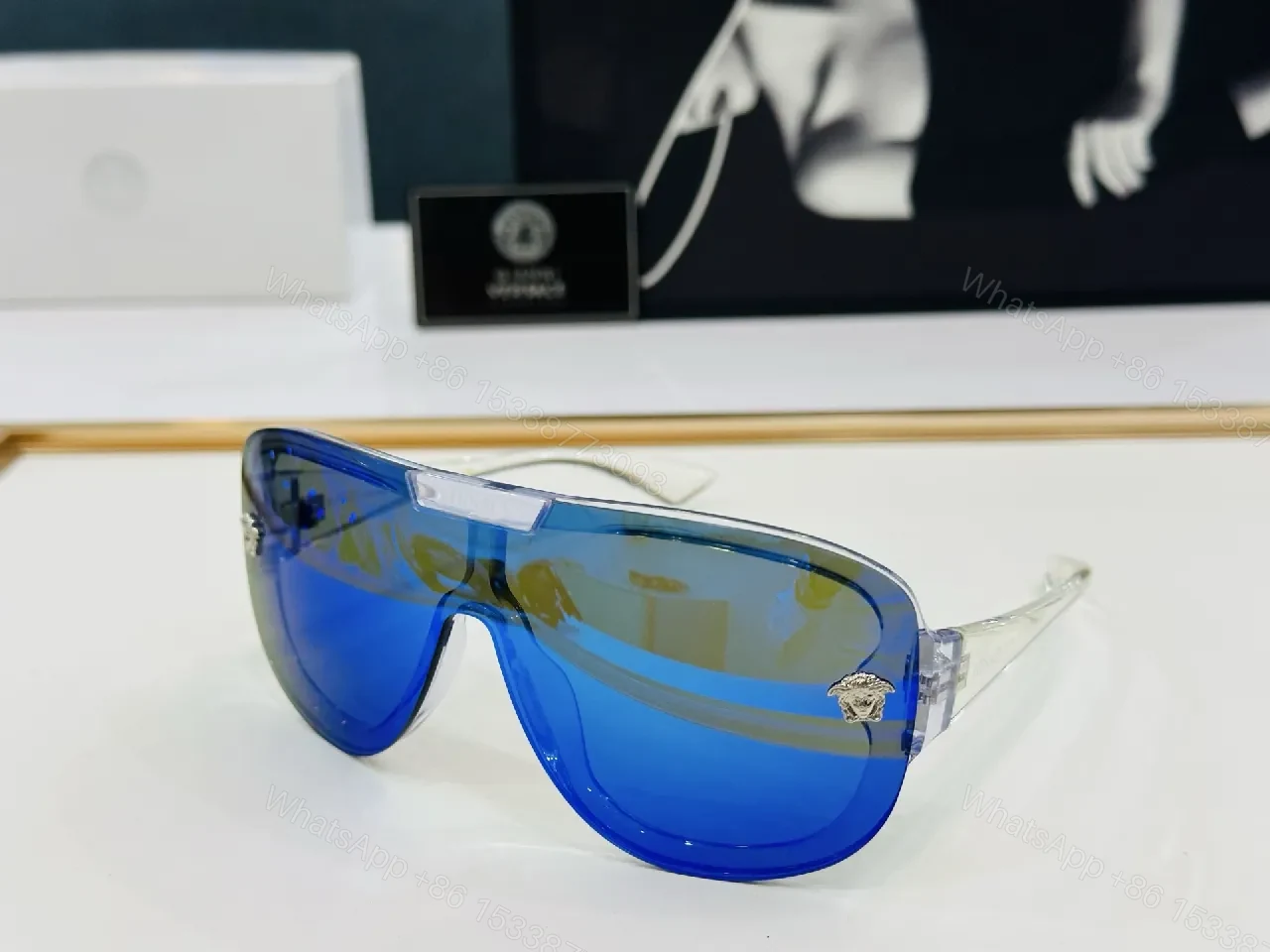View 4 of Black Gloss Shield Sunglasses with Gold Emblems, Oversized Style