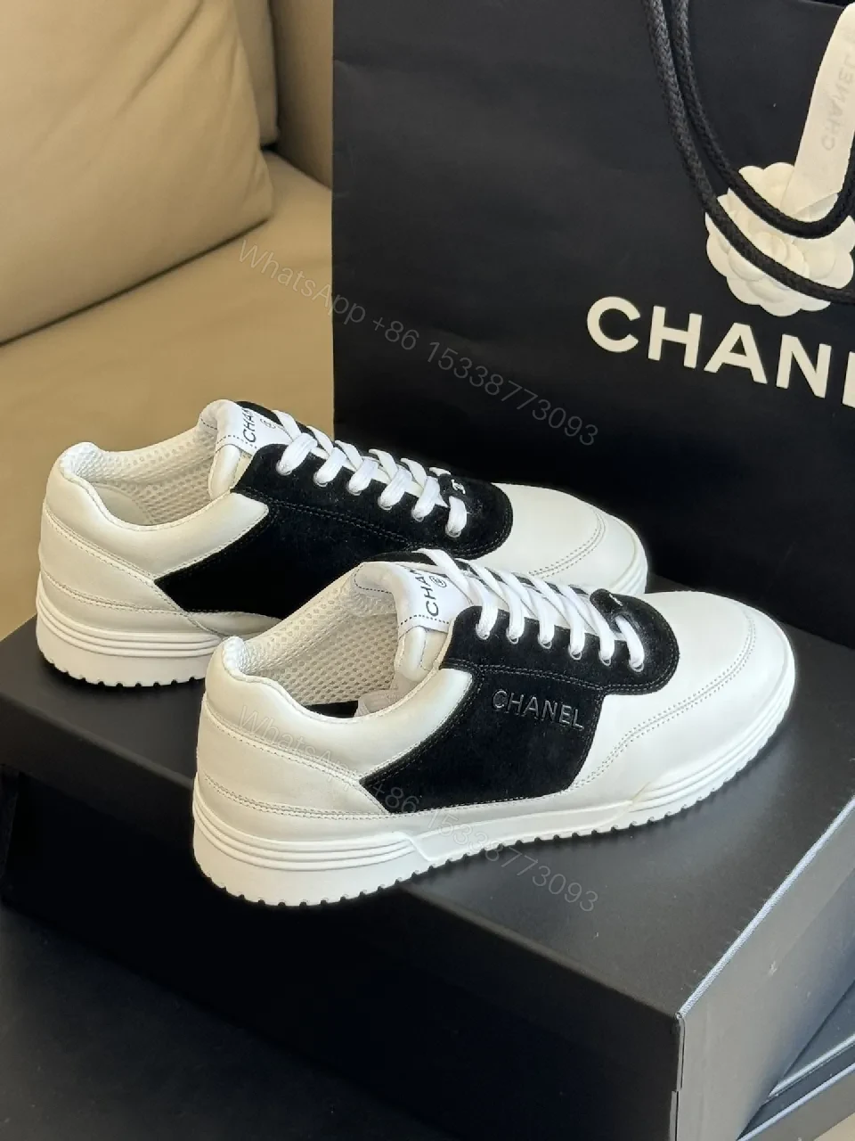 View 4 of Monochrome Leather Sneaker: Refined Comfort & Contrast