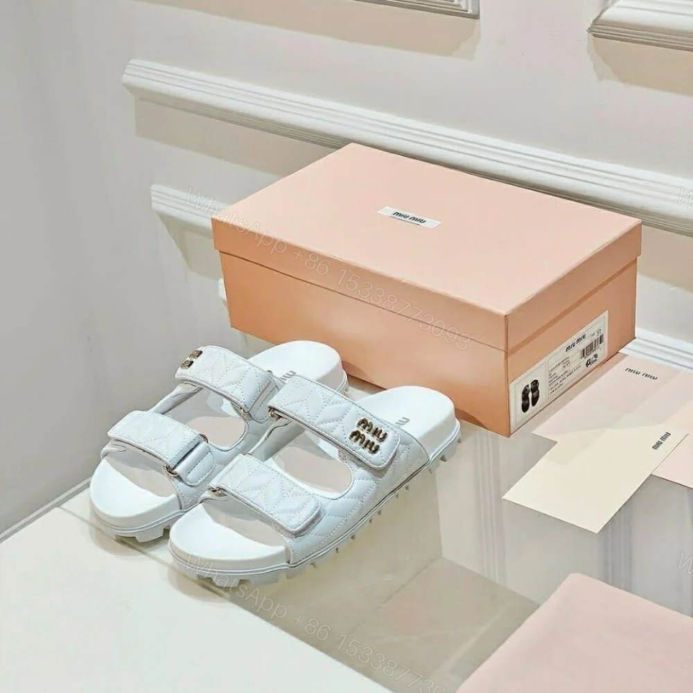 View 3 of MIUMIU MATELASSE NAPPA LEATHER SLIDES WHITE