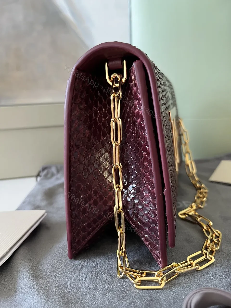 View 8 of Burgundy Python Textured Clutch with TF Gold Hardware