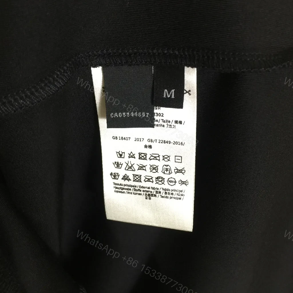 View 5 of Black Cotton T-Shirt + Minimalist Logo + Modern Crew Neck + Subtle Luxe Detail + T-Shirt