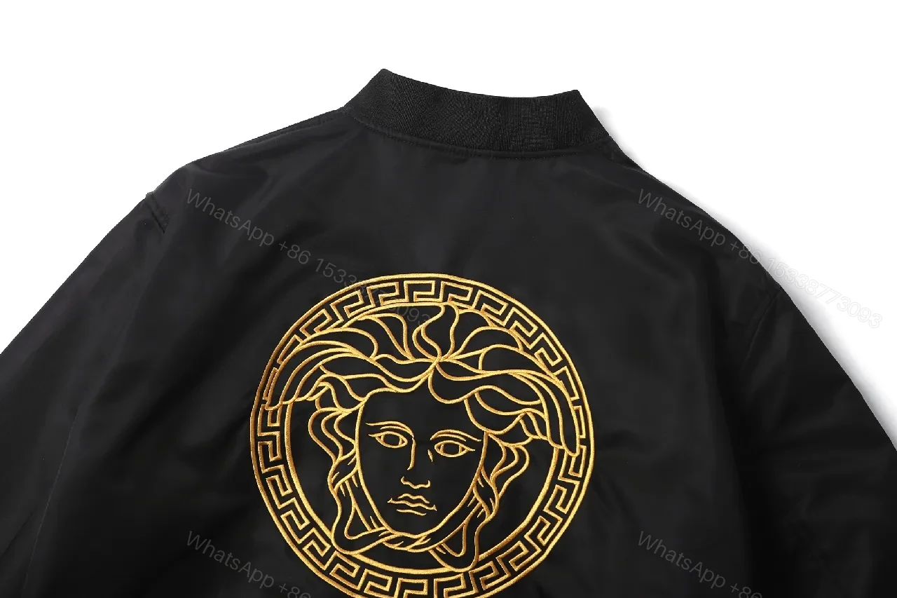 View 7 of Minimalist Black Bomber with Gold Accent: Modern Luxury Outerwear