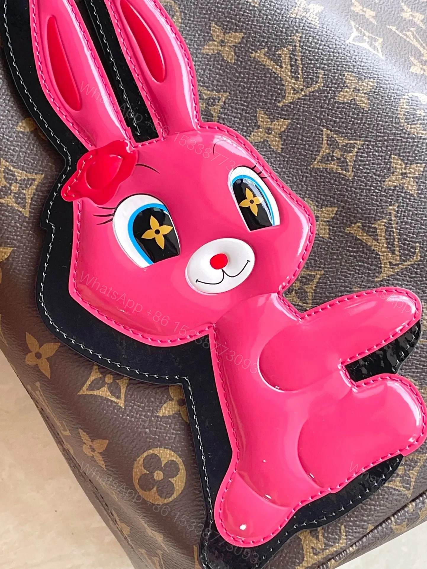 View 2 of LV NEVERFULL MM IN BROWN MONOGRAM CANVAS WITH PINK RABBIT PATCH