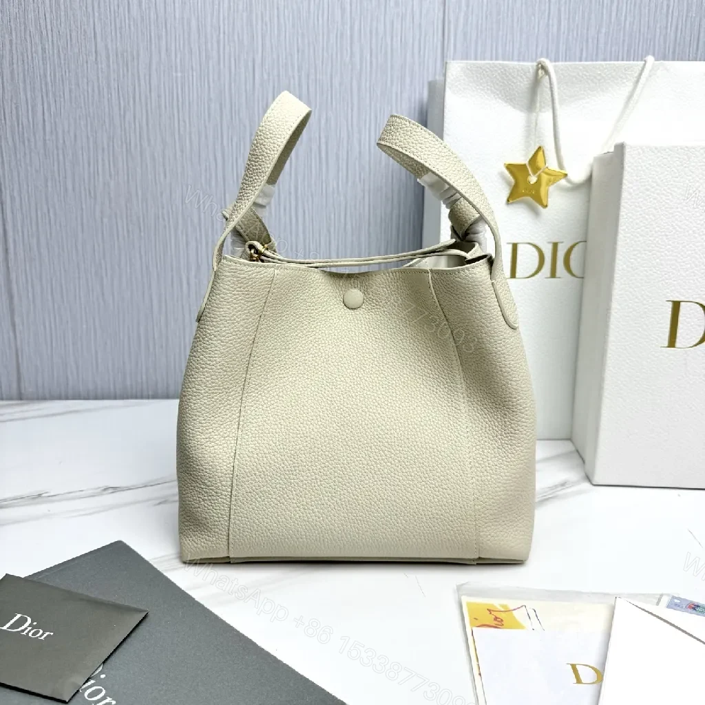 View 8 of Pebbled Leather Minimalist Bucket Bag - All-Day Luxury