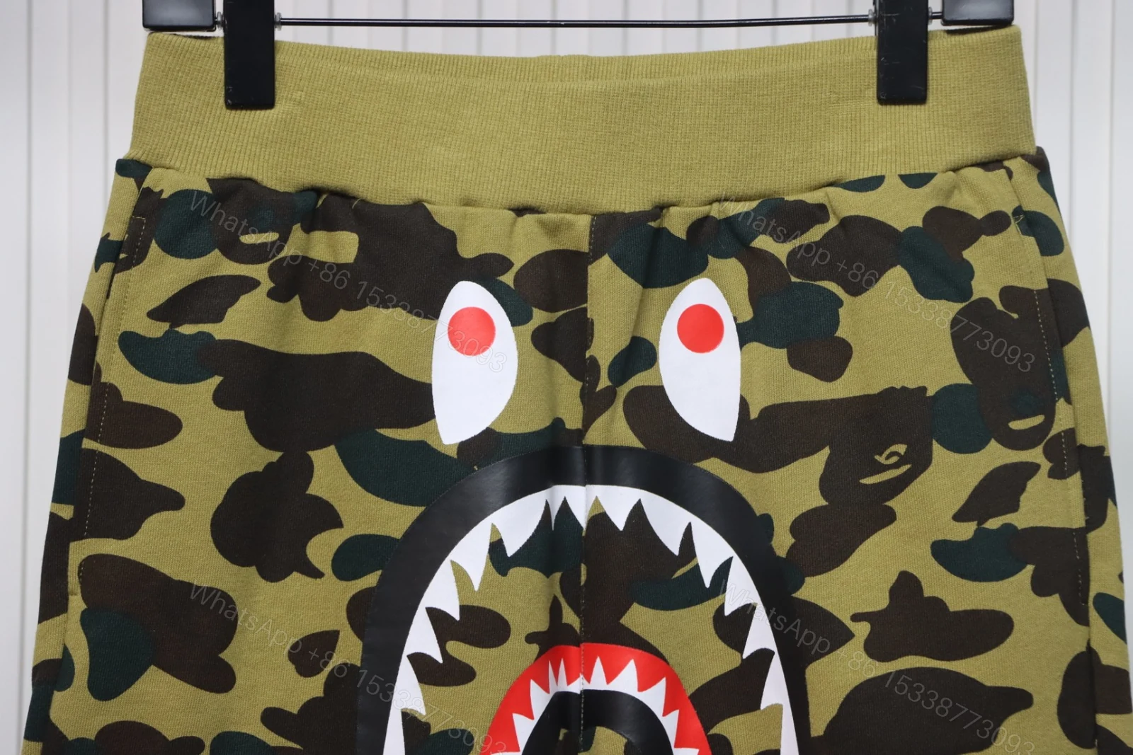 View 2 of Bape Camo Shark Shorts Pink Green
