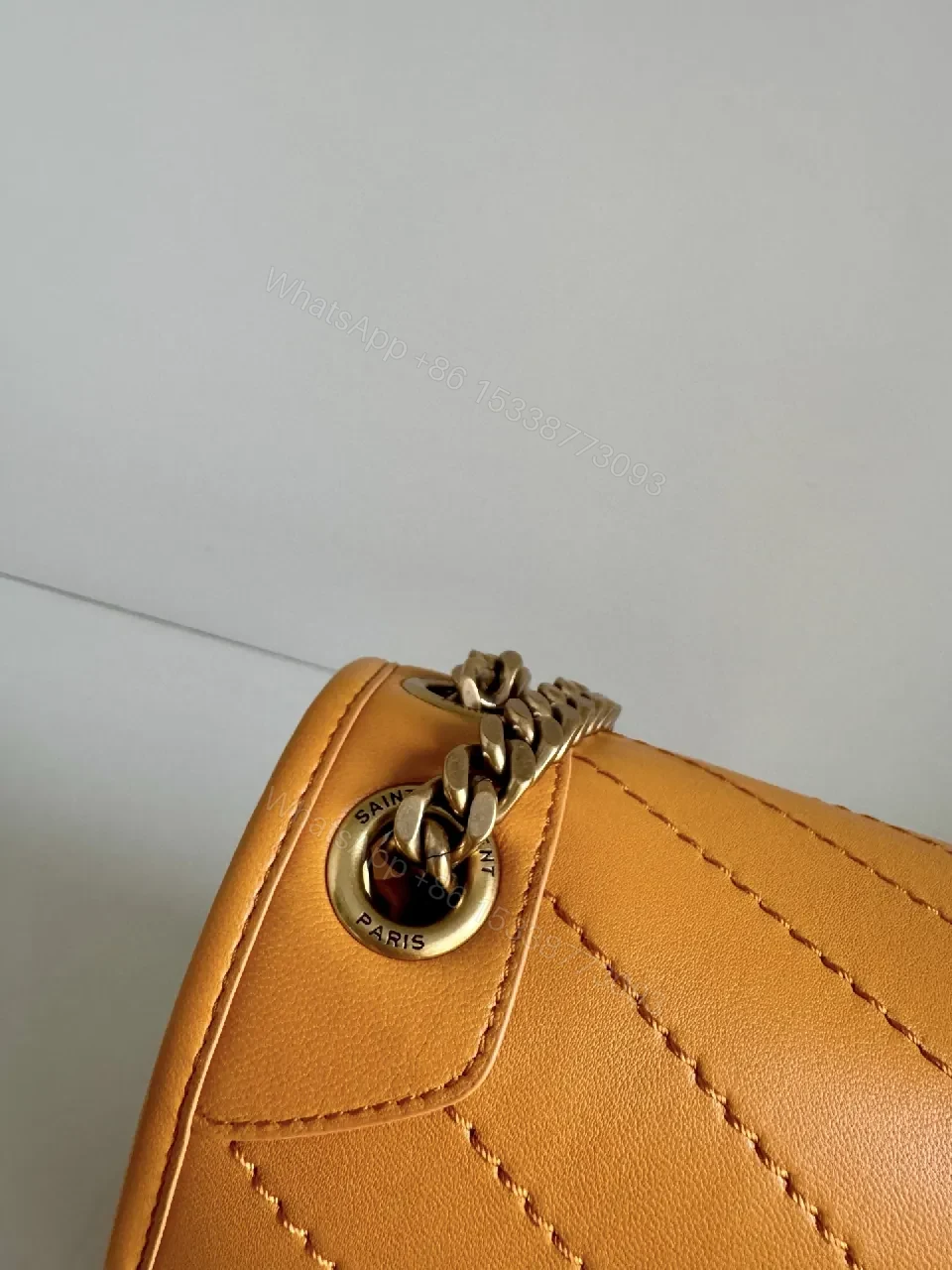 View 4 of Mustard Quilted Leather Crossbody with Chain Strap