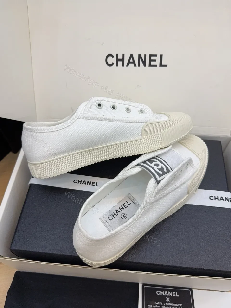 View 9 of Refined Canvas Sneaker: Luxe Logo-Front High-Top Comfort