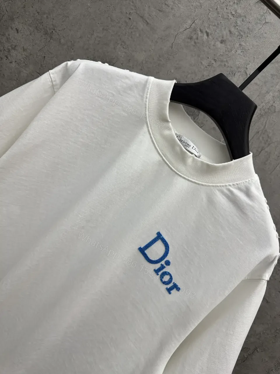 View 8 of Minimalist White Tee with Blue Embroidered Logo, Premium Cotton