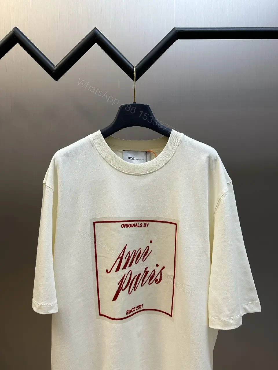 View 7 of Paris Flair Tee: Off-White Cotton Blend, Minimal Crest Graphic