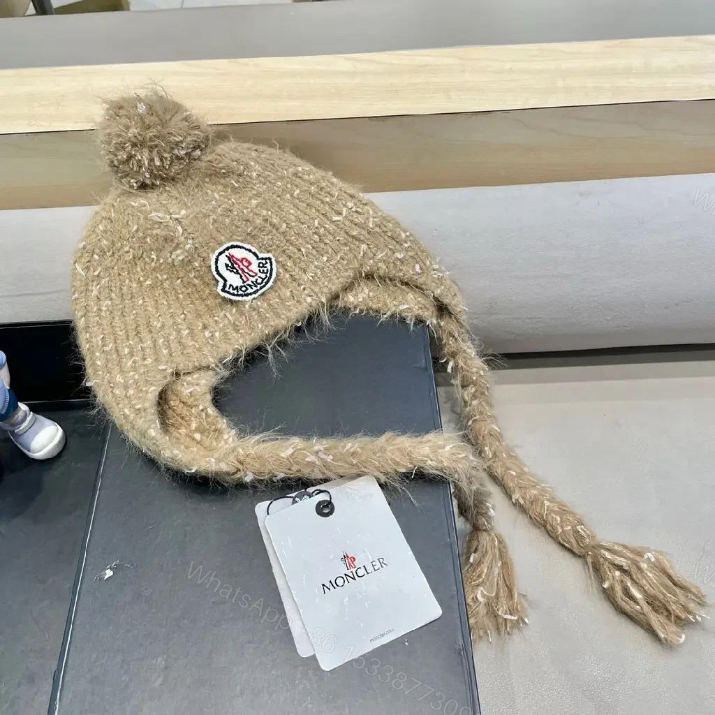 View 8 of Cozy Boucle Knit Beanie with Moncler Patch – Textured Warmth