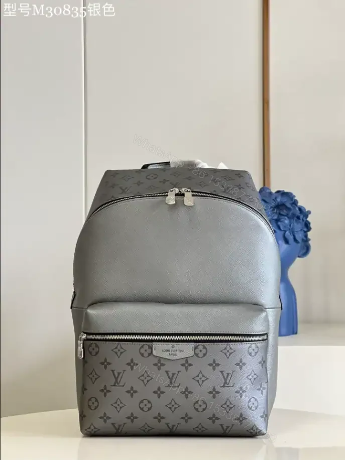 View 2 of LOUIS VUITTON DISCOVERY BACKPACK PM TAIGARAMA – LBV387