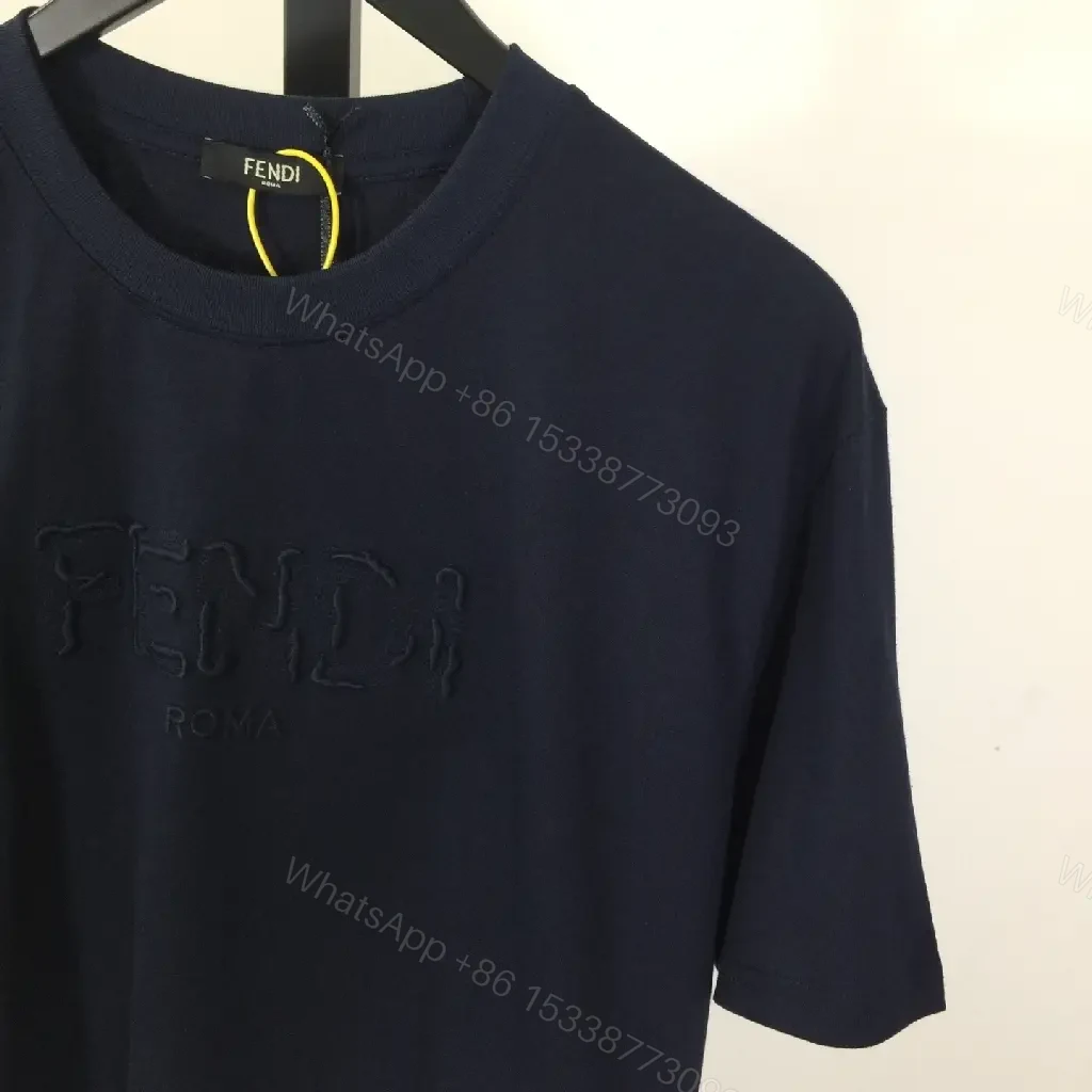 View 3 of Navy Cotton Blend Tee: Subtle Logo, Relaxed Fit, Versatile