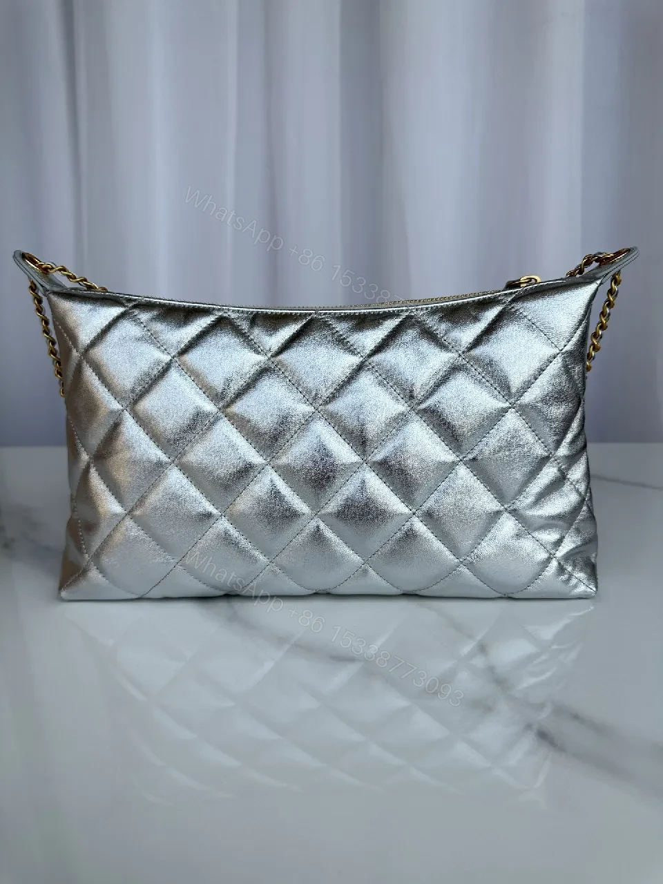 View 3 of Metallic Quilted Chain Bag: Modern Luxury Everyday Versatility