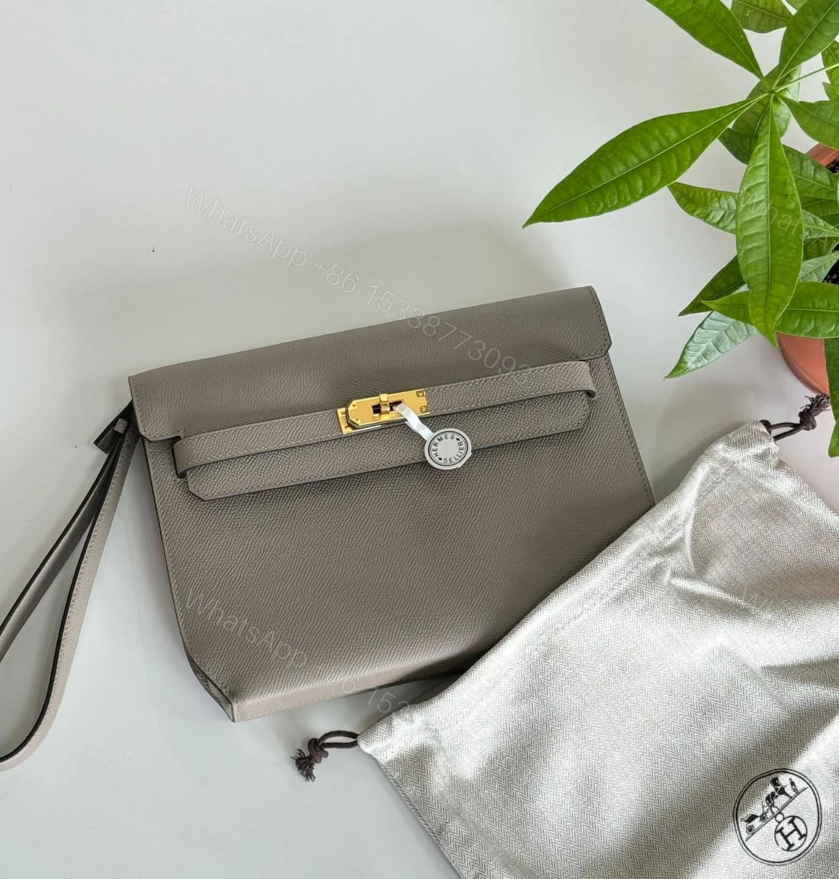 View 2 of Hermes Kelly Depeches 25 Pouch in Bordeaux Epsom Calfskin
