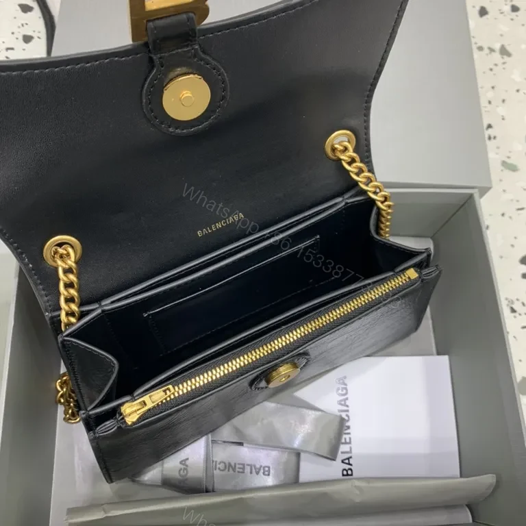 View 2 of Chic Black Leather Mini Bag with Gold B Clasp â€“ Compact Luxury