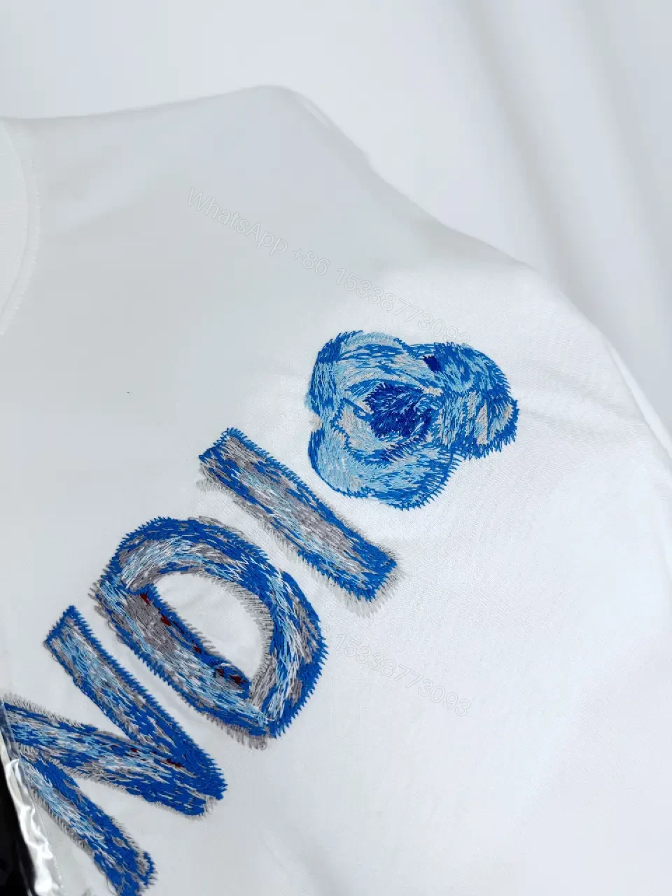 View 7 of Lightweight White Cotton Tee + Embroidered Blue Logo + Minimalist + Designer Flair + T-Shirt