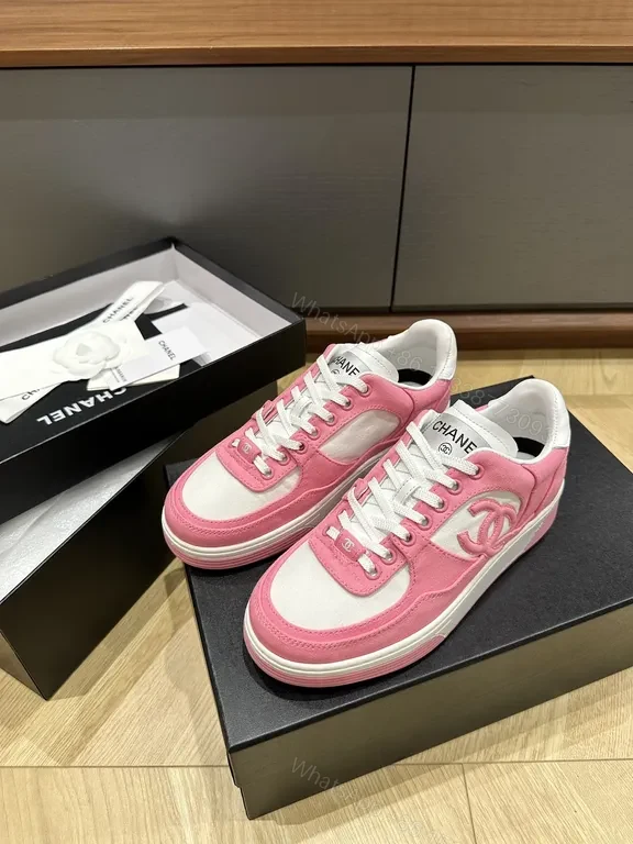 View 5 of Chic Pink & White Coach-Style Sneakers: Luxury Comfort