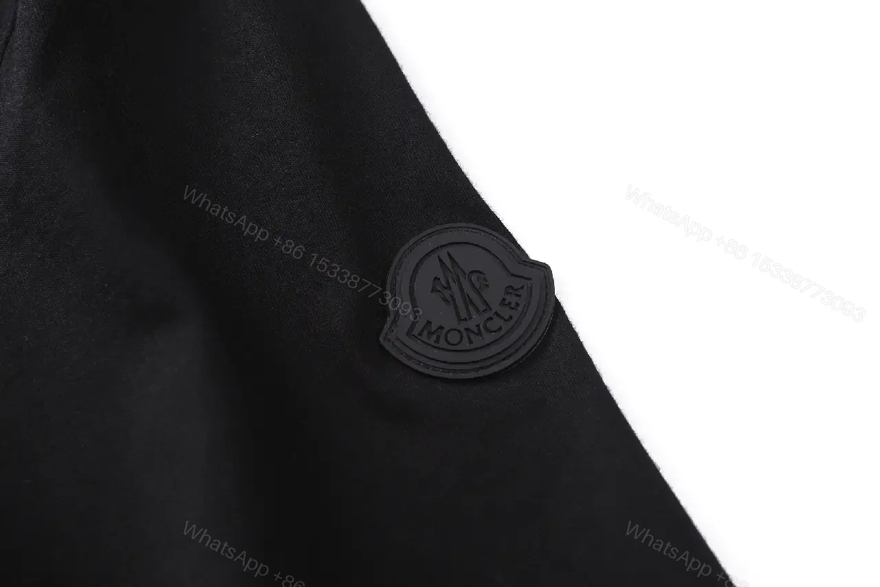 View 8 of Minimalist Black Cotton Tee – Elevated Everyday Essential, Relaxed Fit