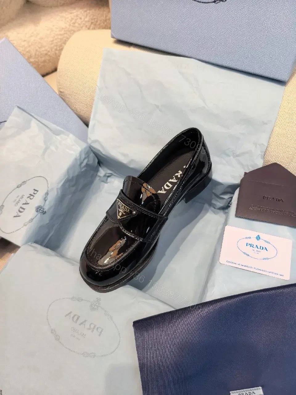 View 9 of Black Patent Leather Loafers Prada Style Feature: Logo Detail Shoe Type: Loafers
