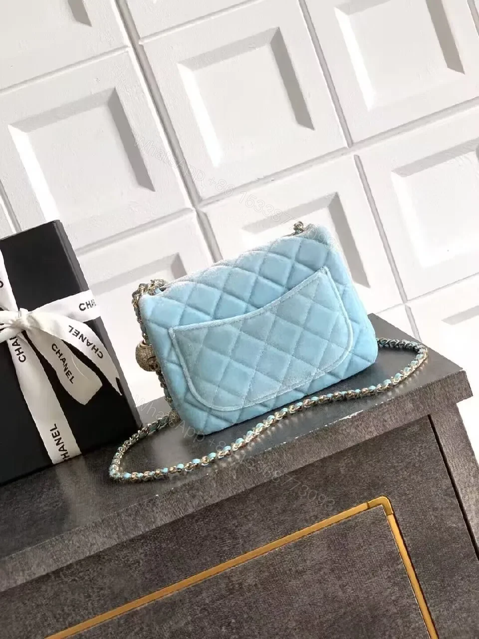 View 5 of Sky-Blue Quilted Mini Bag: Diamond Pattern, Gold Hardware, Crossbody Versatile