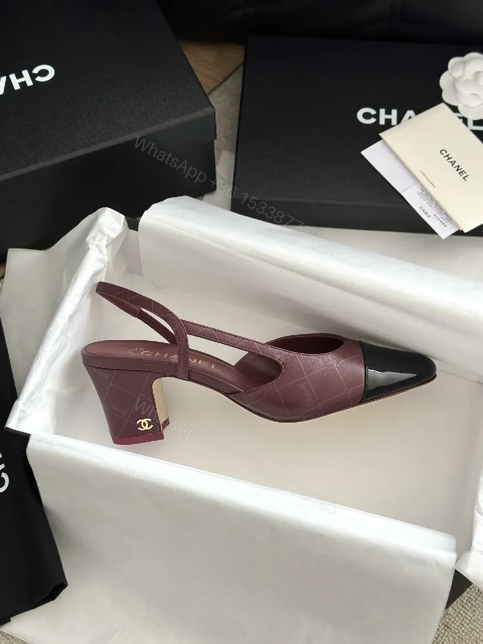 View 9 of Burgundy Leather Slingback Heels with Black Cap Toe