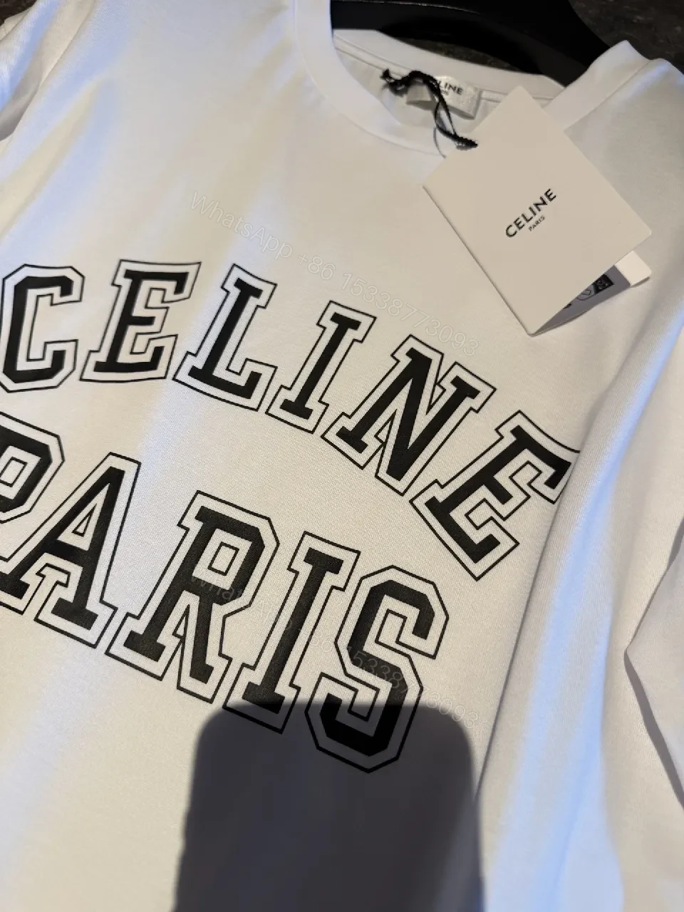 View 8 of White Cotton Modern Tee: Bold Logo, Premium Comfort, Everyday Style