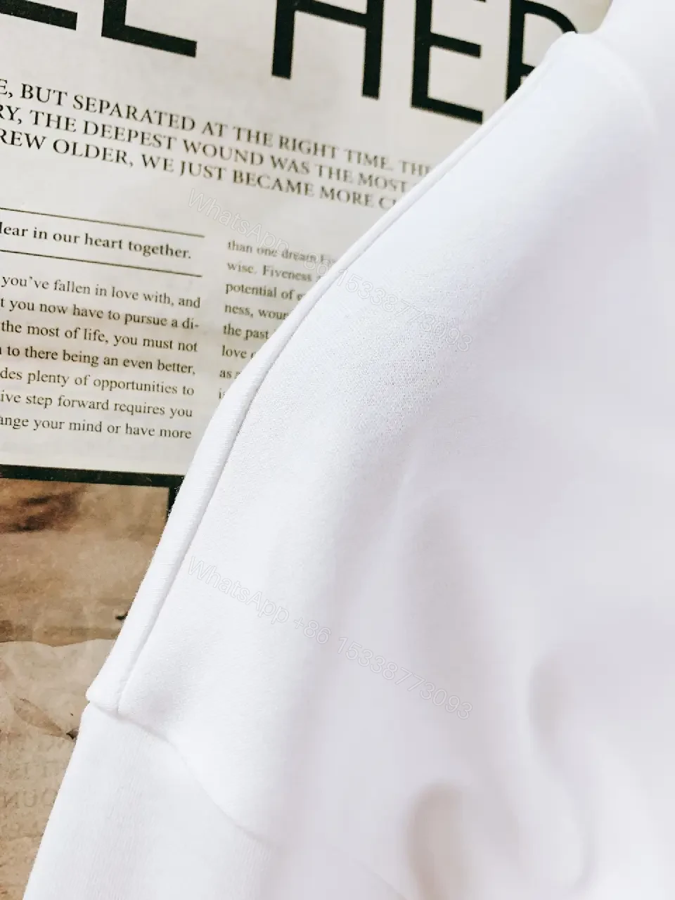 View 3 of Minimalist White Cotton Tee with Subtle Luxury Detail