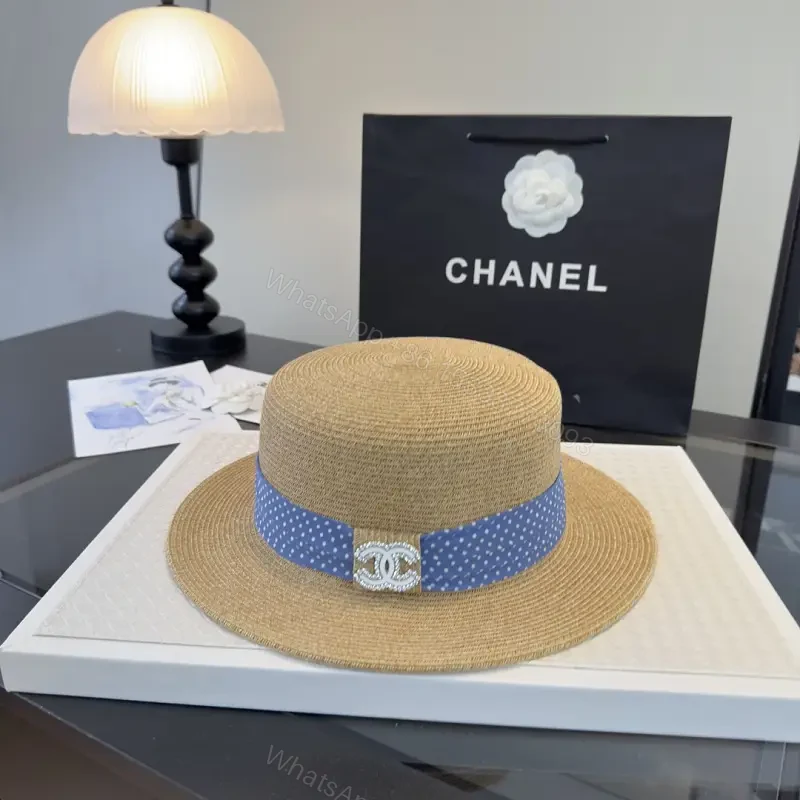 Natural Tan Straw Boater Hat with Blue Polka Dot Band and Chanel Clasp — view 1