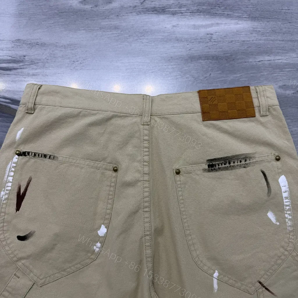 View 4 of Beige Denim-Style Shorts with LV Details, Distressed Comfort