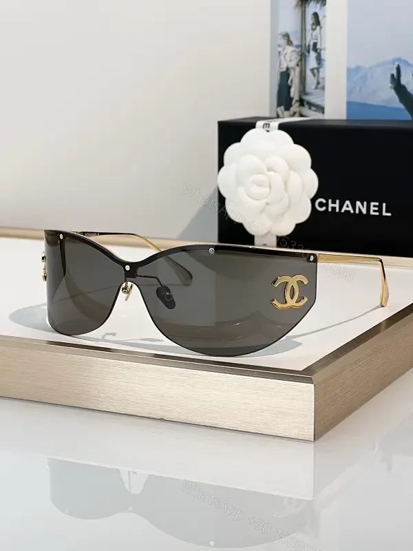 Lux Black Gold Shield Sunglasses with Chanel Logo — view 1