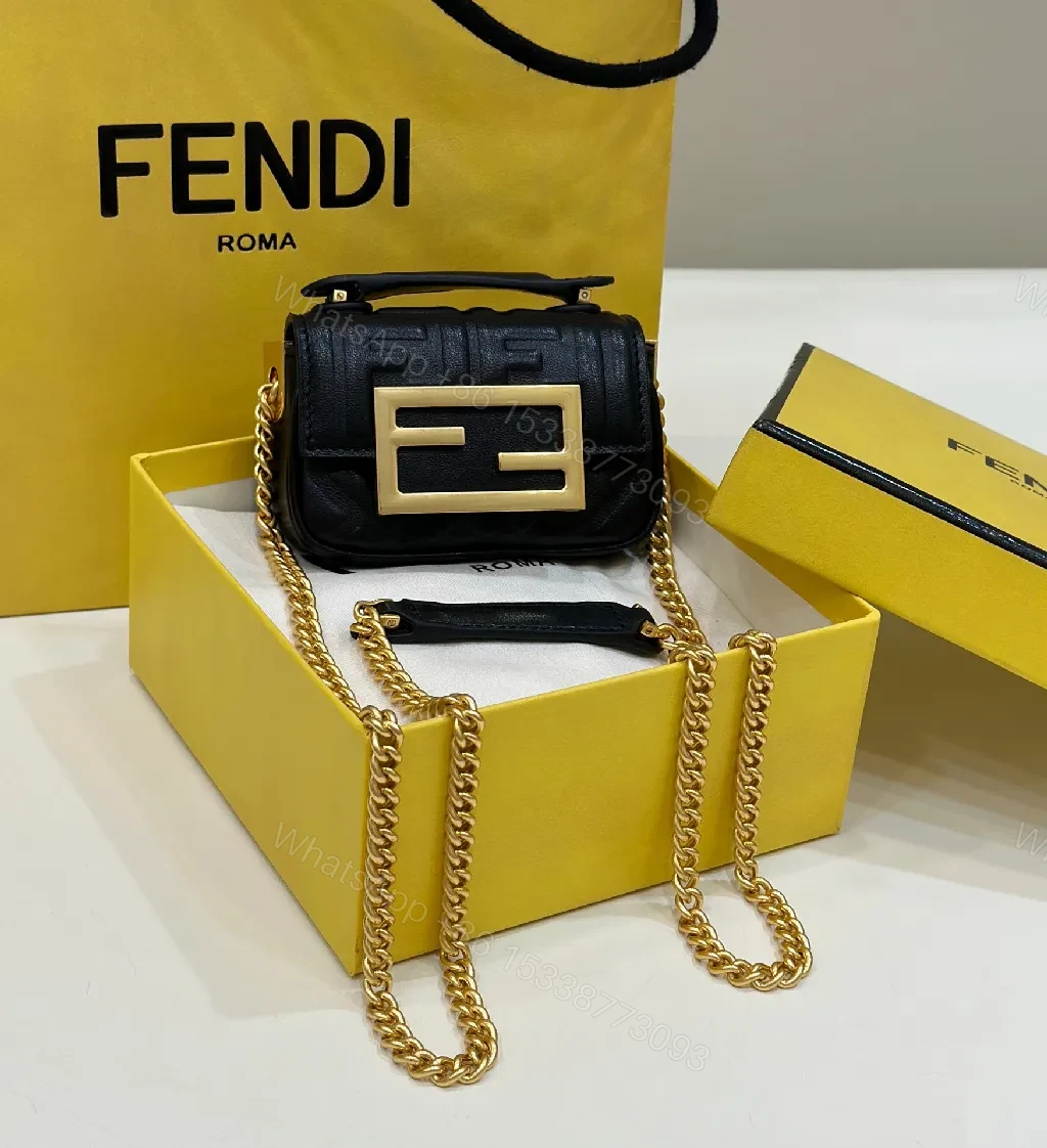 Compact Leather Crossbody: Textured Luxury with Gold Chain Strap — view 1