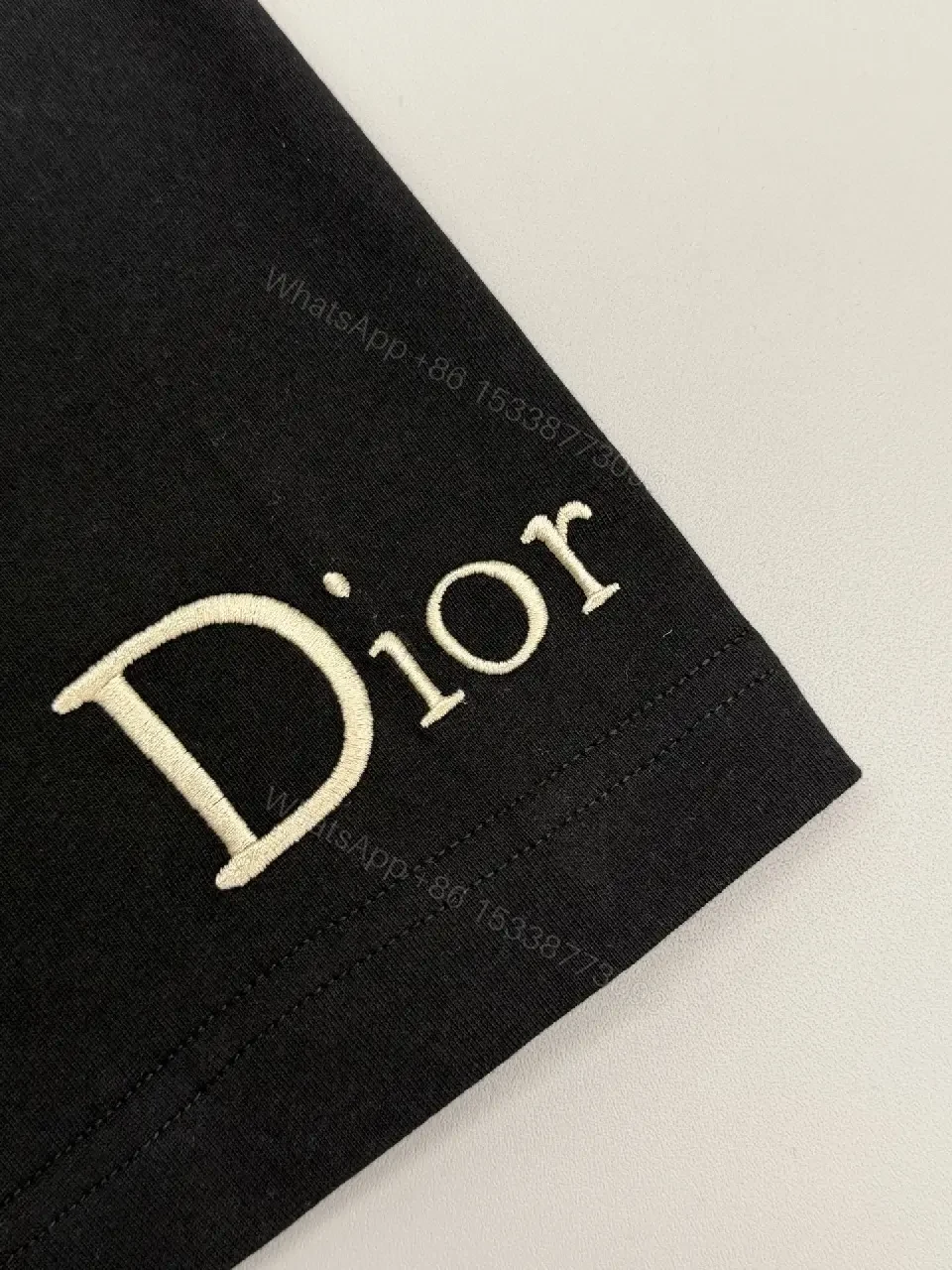 View 3 of Bold Black Cotton Tee: Subtle Luxe Dior Graphic