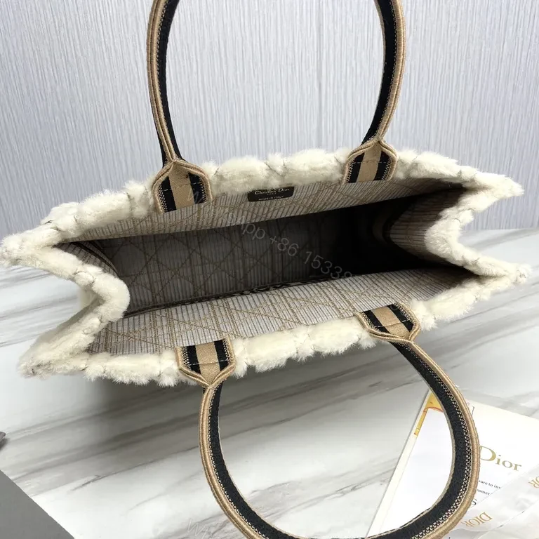 View 8 of Cream Shearling Dior Tote â€” Textured Luxury with Bold Signature Band