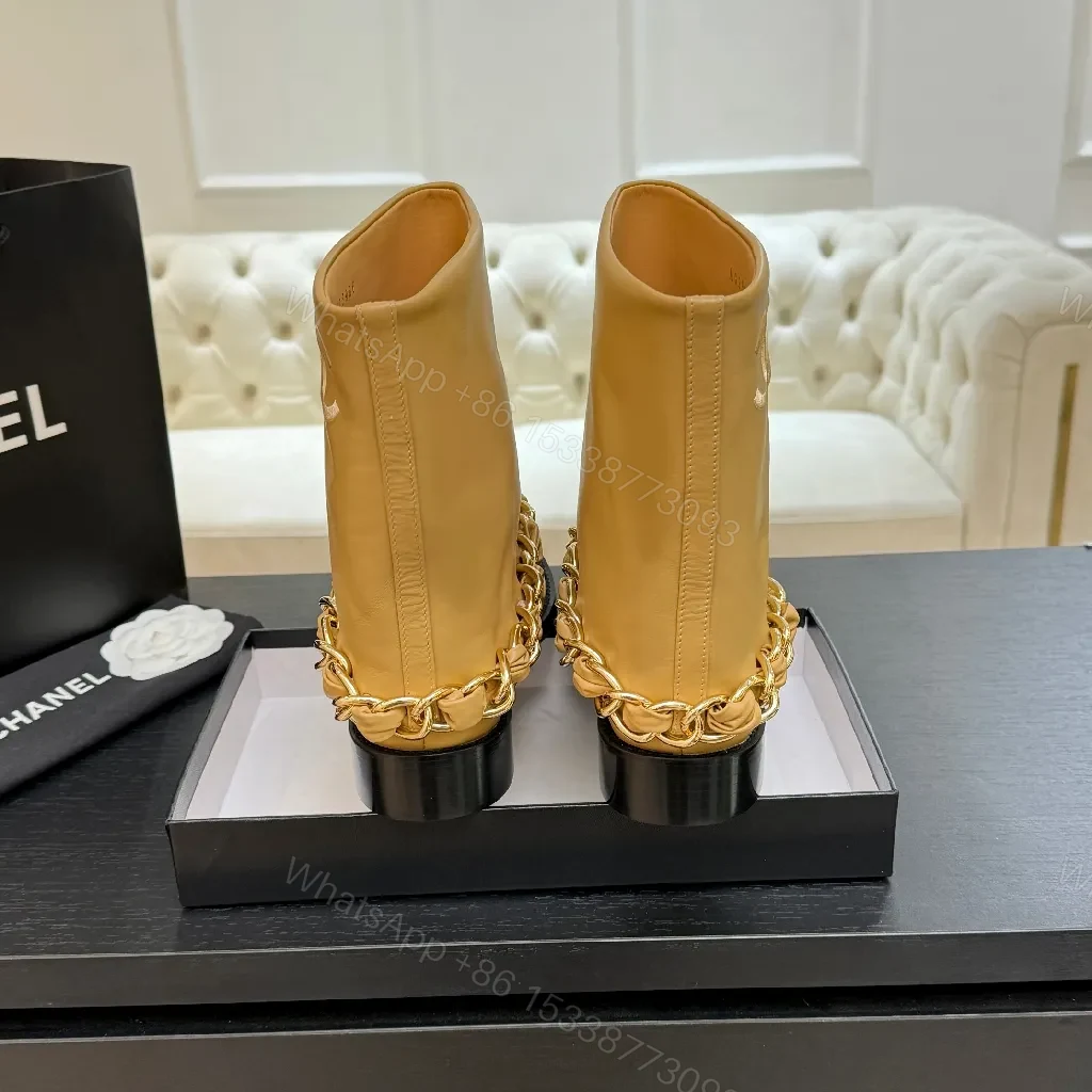View 6 of Chic Tan Leather Boots with Black Toe Cap and Chain Detail