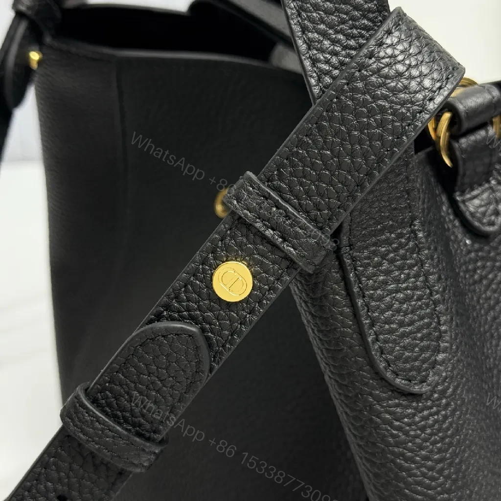 View 7 of Compact Black Pebbled Bucket Bag - Structured Luxury Everyday
