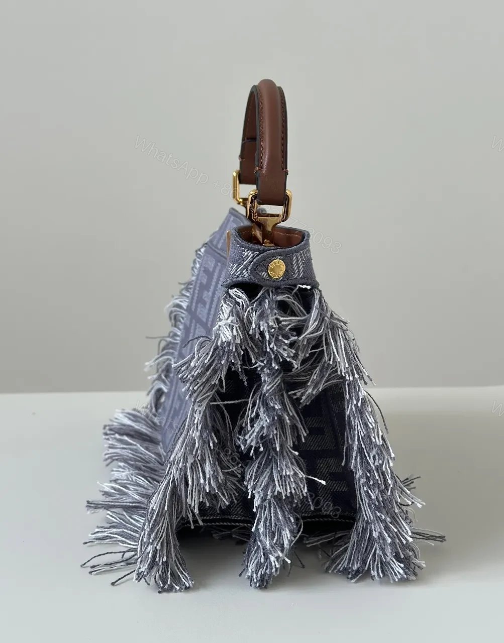 View 7 of Structured Chic Monogram Fringe Handbag - Textured Luxe Tint