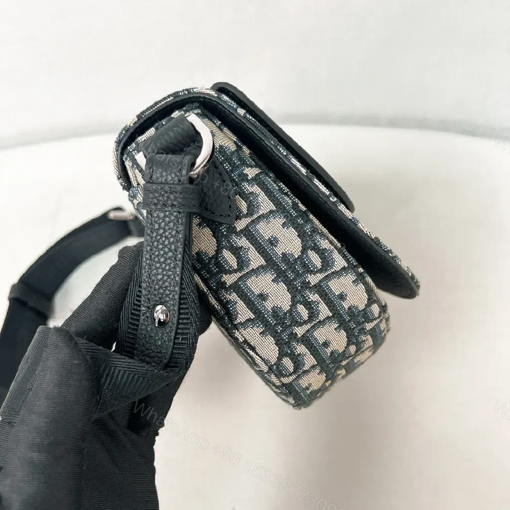 View 7 of Chic Monogram Crossbody Bag: Textured Leather, Modern Utility