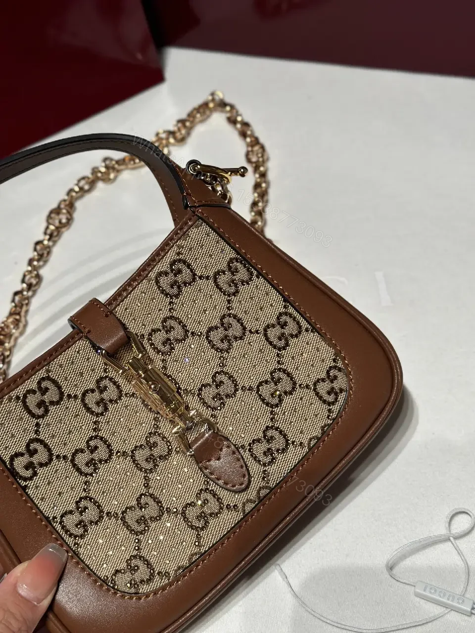 View 5 of Beige GG Supreme Satchel: Mini Structured Elegance, Gold Hardware