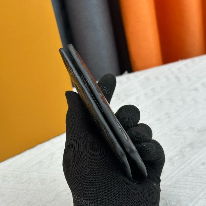 View 3 of Louis Vuitton Pocket Organizer In Black Monogram Shadow Calfskin 11cm LV M62899