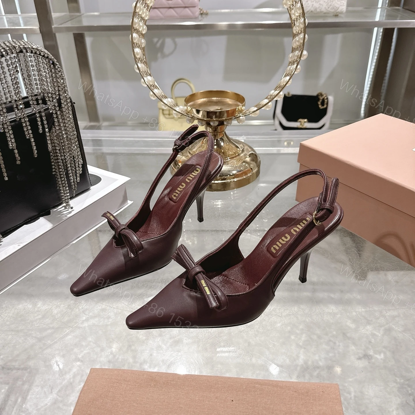 View 4 of Miu Miu Slingback Pumps With Bow Red