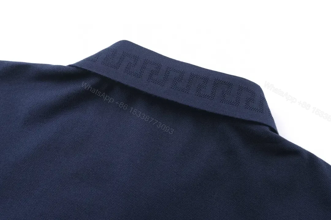 View 2 of Minimalist Navy Knit Polo: Subtle Crest Luxury Polo