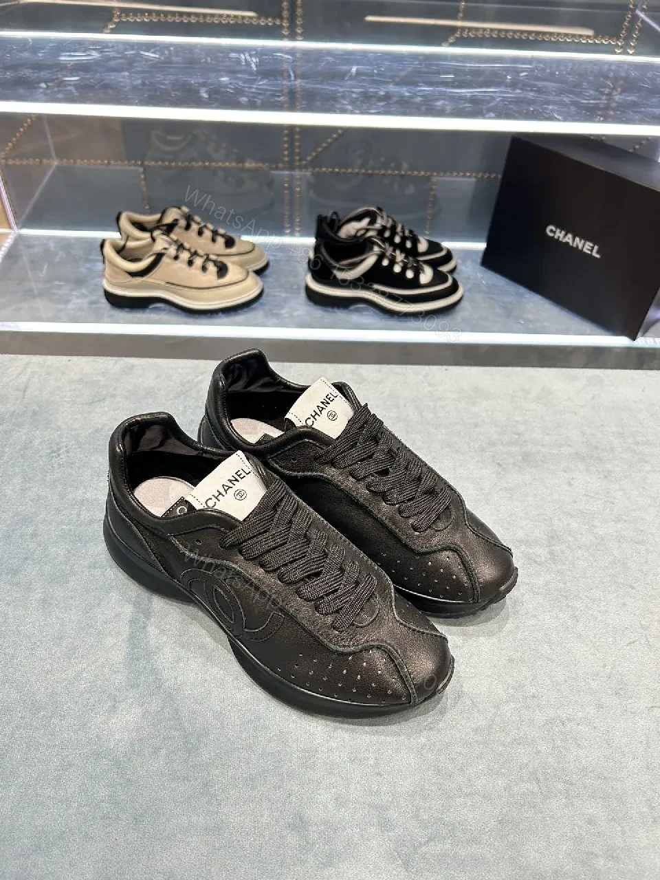 View 2 of Black Leather-Trim Sneaker with Perforations + Luxe Casual Sneakers