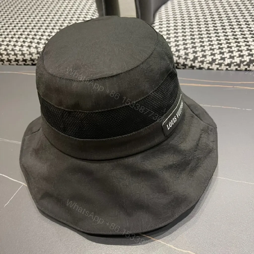View 8 of Minimalist Black Bucket Hat with Discreet Luxe Label