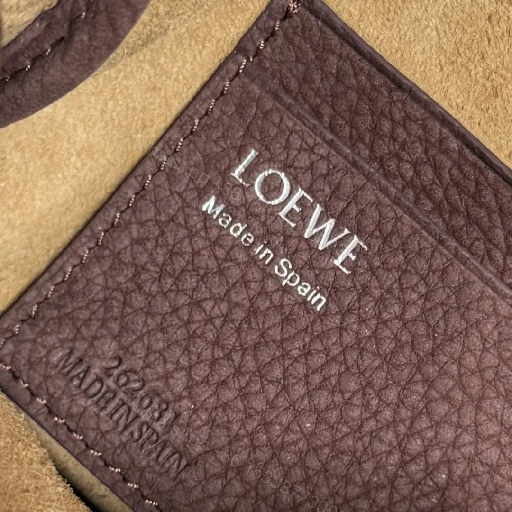 View 9 of Compact Burgundy Pebbled Leather Messenger