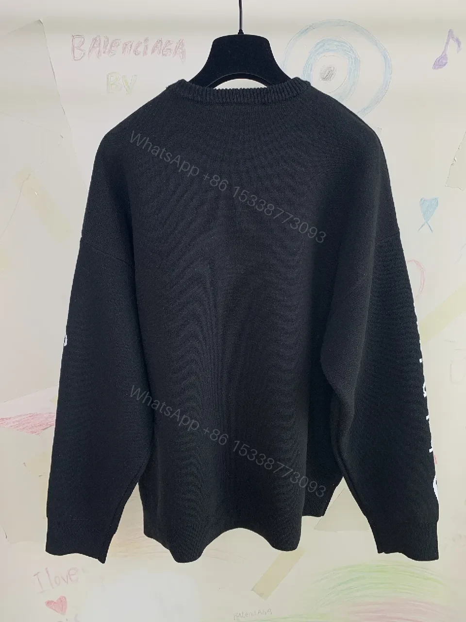View 4 of Black Knit Luxe: Bold Texture, Subtle Branding Knitwear