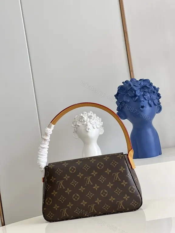 View 7 of Louis Vuitton Monogram Top-Handle Bag: Compact Luxury for Day to Night