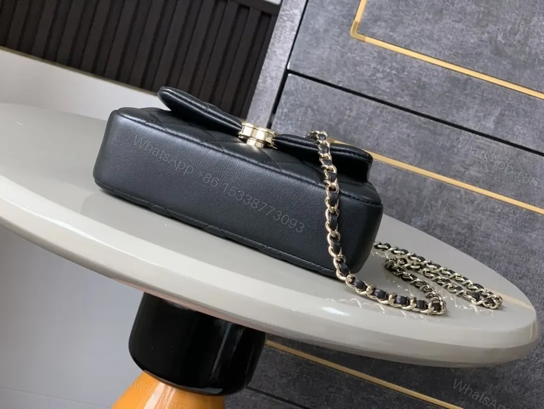 View 4 of Compact Quilted Leather Crossbody with Gold Logo Crossbody Bag