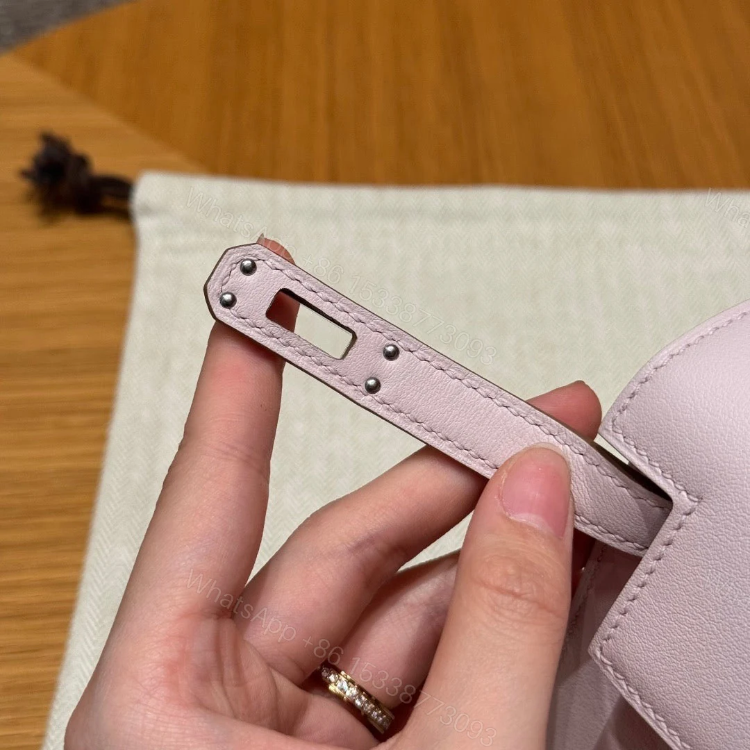View 3 of HERMES KELLY POCHETTE 22 IN LIGHT PINK SILVER HARDWARE